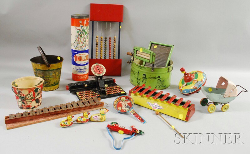 Thirteen Assorted Mostly Tin and Metal Toys, incl: Thirteen Assorted Mostly Tin and Metal Toys, including xylophones, a wash tub, pails, a typewriter, and Tinker Toys.