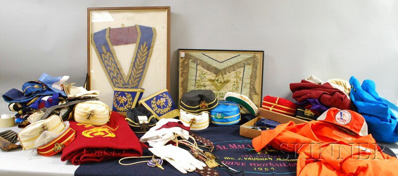 Large Group of Masonic Clothing and Textiles, incl: Large Group of Masonic Clothing and Textiles, including blazers, neckties, blankets, cordons, aprons, collars, and hats, three framed.