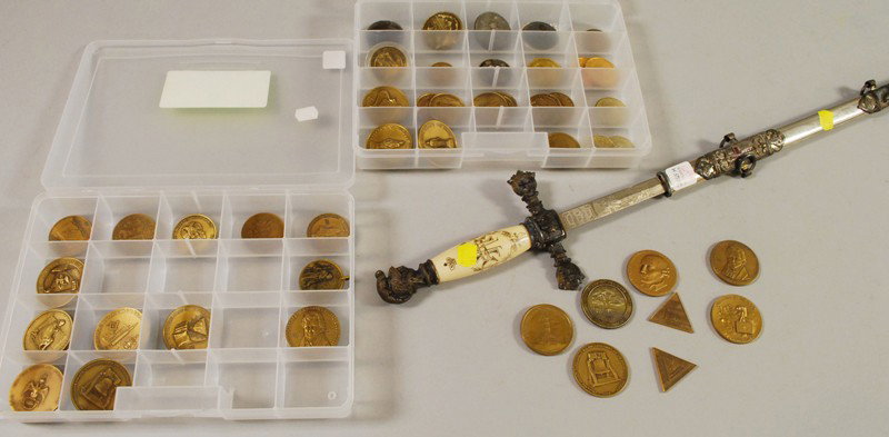 Masonic Sword and a Group of Approximately Forty-f: Masonic Sword and a Group of Approximately Forty-five Masonic Coins and Medallions, the sword with ivory handle.