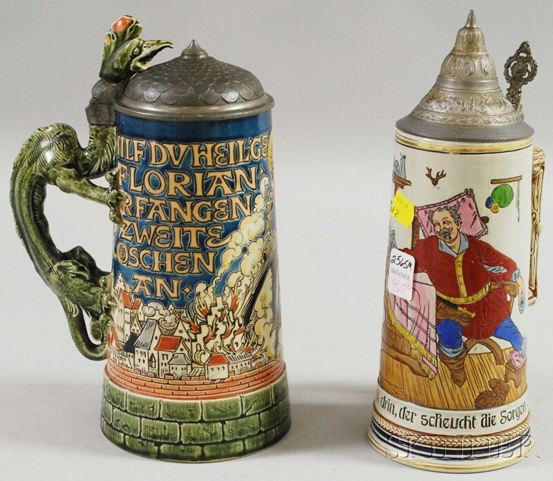 Two Mettlach Etched Stoneware Steins with Pewter C: Two Mettlach Etched Stoneware Steins with Pewter Covers, a one-liter no. 1786 and a no. 930.