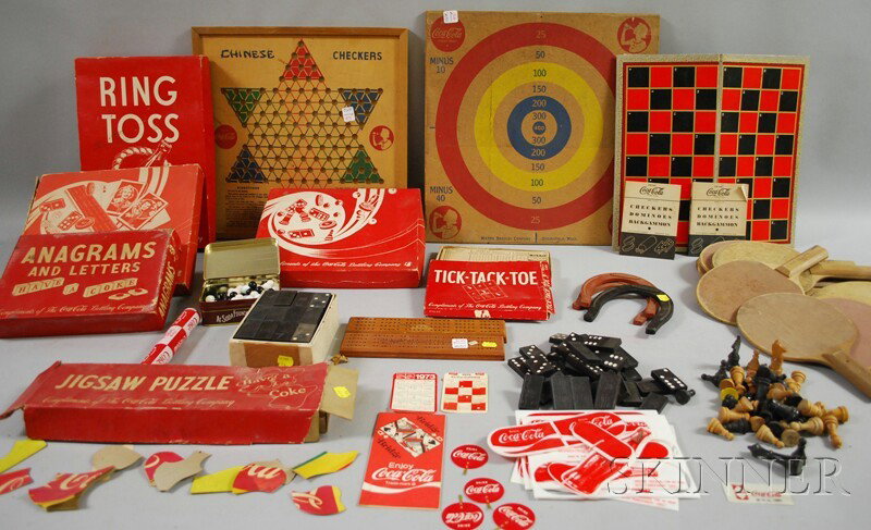 Group of Coca-Cola "Games for Young America" and : Group of Coca-Cola "Games for Young America" and Other Coca-Cola Games and Toys, 1930s-1970s, including Chinese checkers, a dart board, ping pong paddles, a Styrofoam glider, checkers/dominoes/backgam