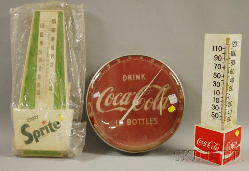 Two Coca-Cola Plastic Wall Thermometers and a Spr: Two Coca-Cola Plastic Wall Thermometers and a Sprite Plastic Wall Thermometer, c. 1970, (one with cracked top cover).