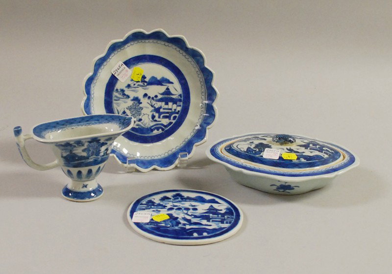 Four Pieces of Chinese Blue and White Porcelain Ta: Four Pieces of Chinese Blue and White Porcelain Tableware, a helmet creamer, covered serving bowl, a trivet, and a bowl with scalloped edge.