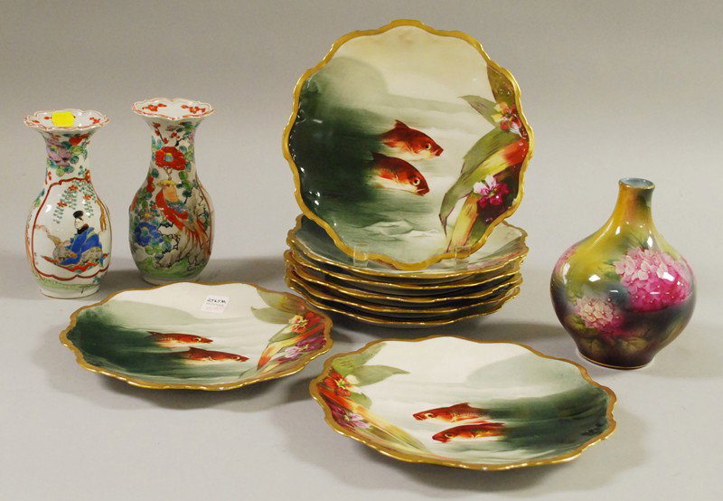 Eleven Pieces of Assorted Continental and Asian Ce: Eleven Pieces of Assorted Continental and Asian Ceramics, a set of eight Limoges hand-painted fish plates, a pair of Chinese porcelain vases, and a Royal Bonn hydrangea-decorated vase, plate dia. 9 1/