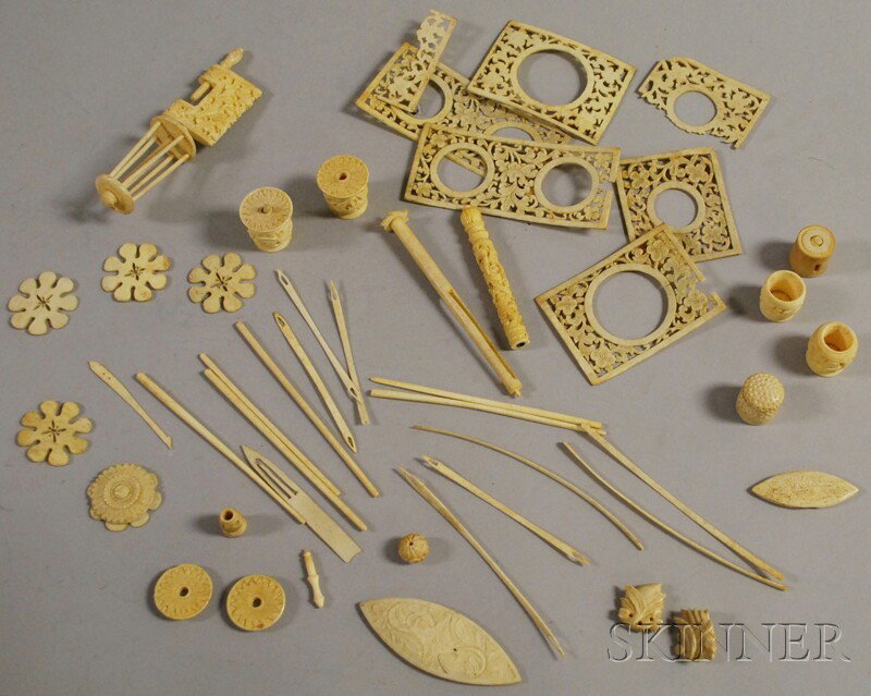 Group of Carved Ivory Mostly Sewing-related Items: Group of Carved Ivory Mostly Sewing-related Items, including thimbles, sewing clamp, and thread winders.