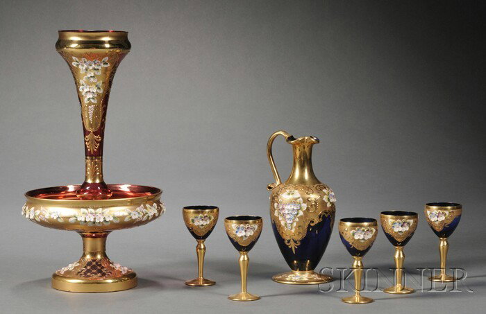 Seven Pieces of Czech Glass with Floral Accents, : Seven Pieces of Czech Glass with Floral Accents, a red epergne with Czechoslovakia seal, ht. 13; and a blue cordial decanter with stamp, ht. 7 3/4, with five cordial stems, ht. 3 7/8 in.; each with go