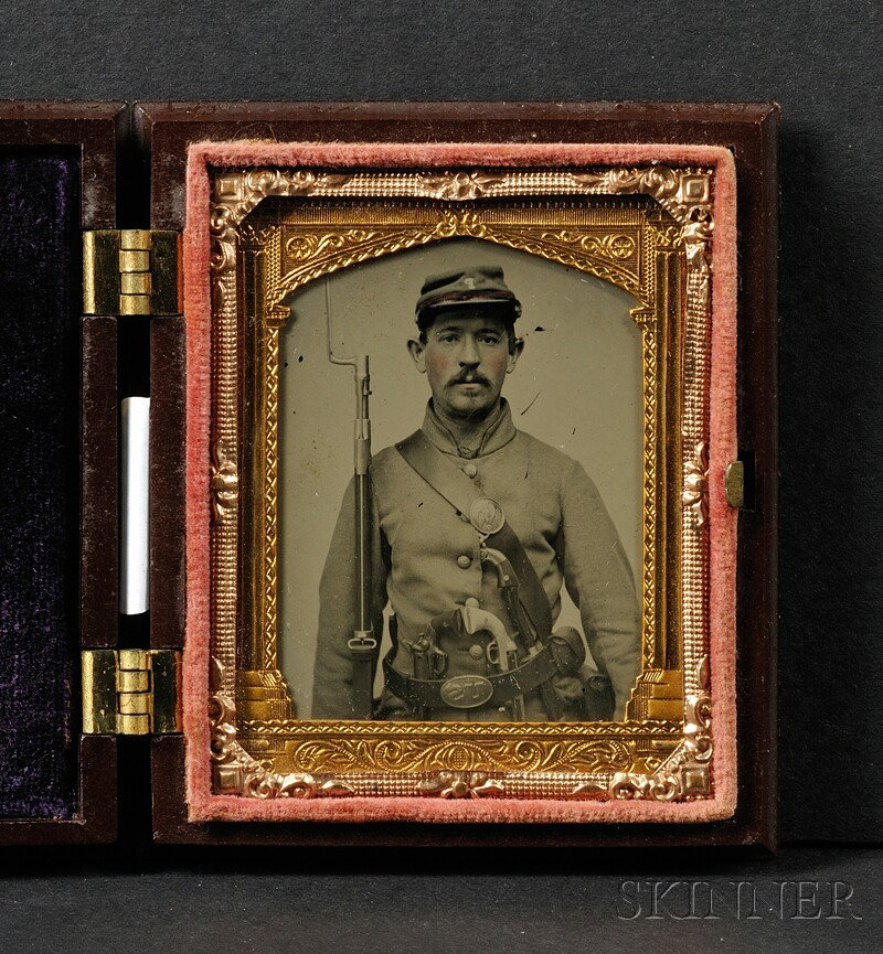 Ninth Plate Ambrotype Portrait of a Heavily Armed S: Ninth Plate Ambrotype Portrait of a Heavily Armed Soldier, in a brown "Constitution and the Laws" and "Singing Bird" (Krainik 371, 398) Union case, (few specks of lacquer loss).
