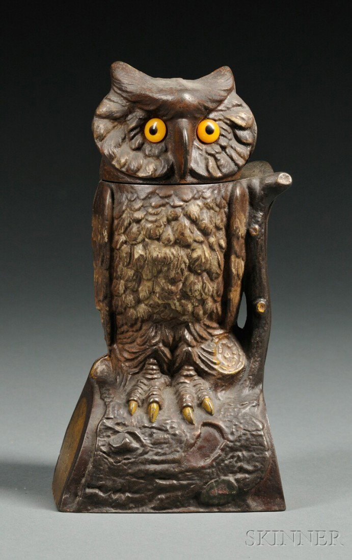 Polychrome Painted Cast Iron Owl Bank, J. & E. Ste: Polychrome Painted Cast Iron Owl Bank, J. & E. Stevens Company, Cromwell, Connecticut, c. 1880, patent number impressed on base, (minor paint wear, missing coin plug), ht. 7 1/2 in.