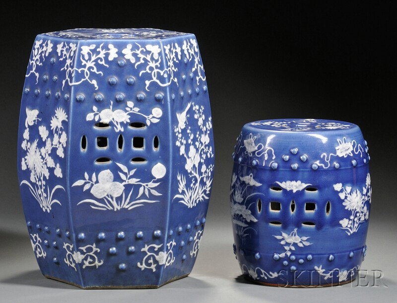 Two Blue and White Chinese Export Porcelain Garden: Two Blue and White Chinese Export Porcelain Garden Seats, late 19th century, one octagonal, decorated with flowers and birds in white against a blue ground; a smaller barrel-form child's seat decorate
