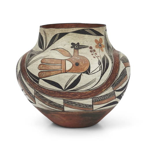 An polychrome pottery bird jar ht. 10 1/4, wd. 10 3/4 in. (0239