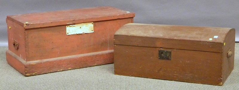 Two Painted Wooden Boxes, a red-painted dovetail-: Two Painted Wooden Boxes, a red-painted dovetail-constructed storage chest and a brown-painted pine dome-top trunk, ht. 15, lg. 34, and ht. 13, lg. 30, wd. 16 1/2 in., respectively.
