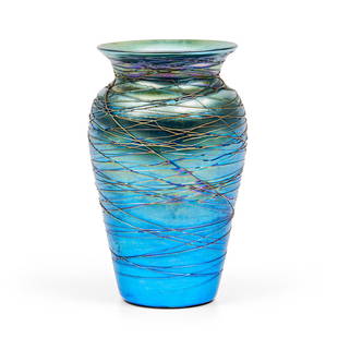 Victor Durand Art Glass Vase, Vineland, New Jersey, early 20th century, iridescent blue ground w...: Victor Durand Art Glass Vase,Vineland, New Jersey, early 20th century, iridescent blue ground with threaded glass decoration, painted mark 'Durand 1812-8,' ht. 7 1/2 in. (19.5 cm).