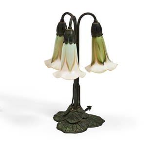 Three-light Lily Table Lamp with Quezal Glass Shades, Queens, New York, early 20th century, gree...: Three-light Lily Table Lamp with Quezal Glass Shades, Queens, New York, early 20th century, green pulled-feather glass shades, marked 'Quezal,' probably Riviere bronze base, three sockets, total ht. 1