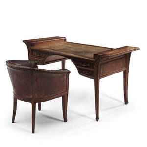 Louis Majorelle (1859-1926) Carved Walnut Desk and Armchair, Nancy, France, the desk 'Algues' pa...