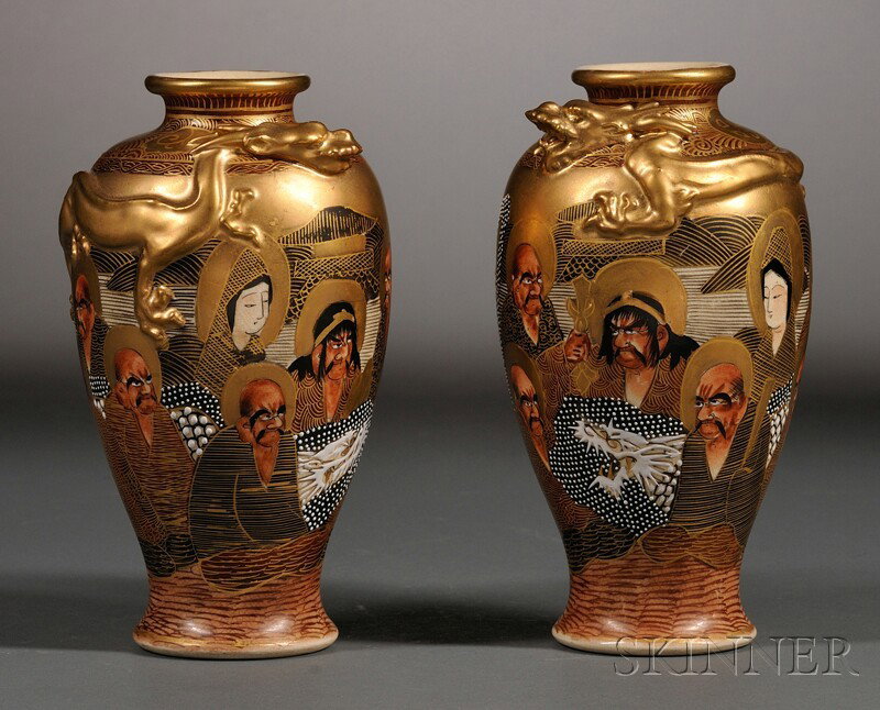 Pair of Satsuma Vases, Japan, 19th century, of bal: Pair of Satsuma Vases, Japan, 19th century, of baluster shape, gilded and enameled decoration on Buddhist disciples and high relief scrolling dragon at shoulder, mark to base, ht. 6 1/2 in.