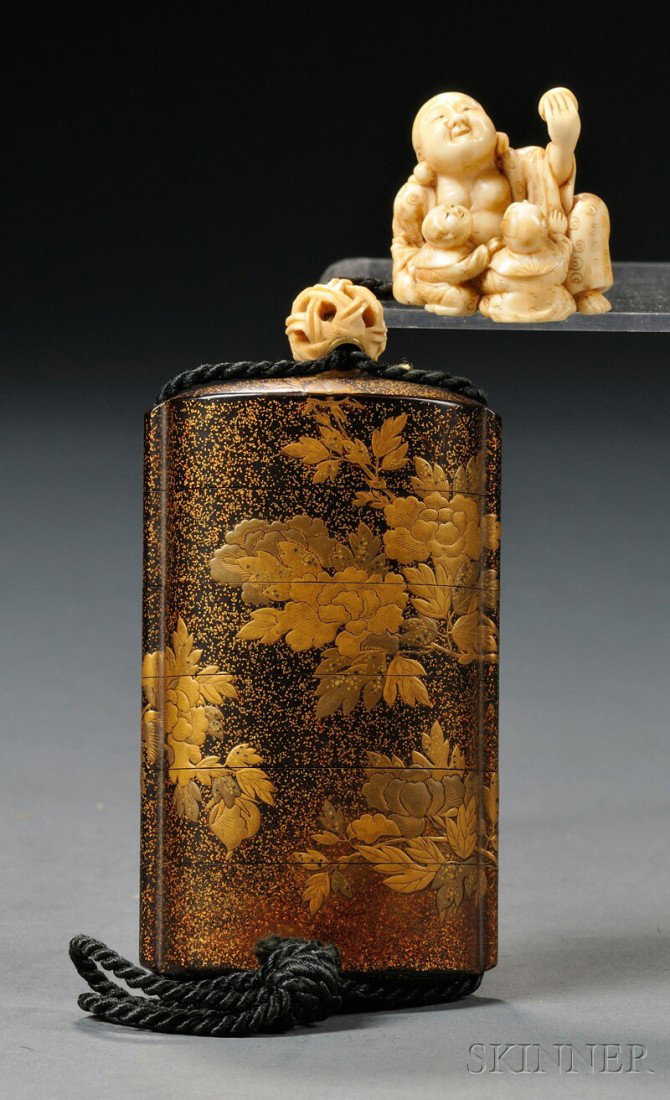 Gilt-lacquer Inro with Netsuke, Japan, 19th century: Gilt-lacquer Inro with Netsuke, Japan, 19th century, the five-cased inro with hiramaki-e decoration of peony branches, with an ivory netsuke of a Buddhist figure playing with two children, lg. 3 1/2 i