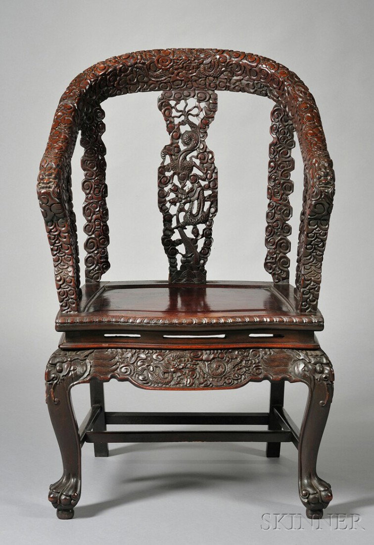 Rosewood Chair, China, elaborately carved with dra: Rosewood Chair, China, elaborately carved with dragon and cloud motif with claw and ball, ht. 40 in.