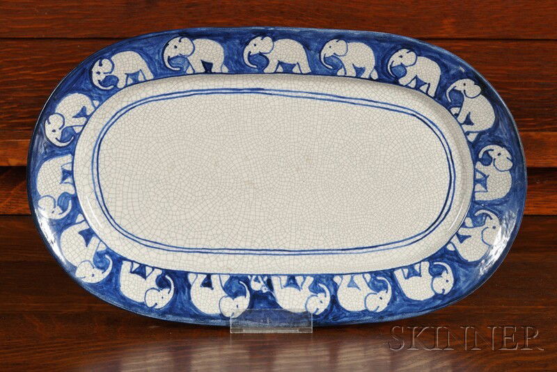 Dedham Pottery Elephant Platter Decorated earthenware D: Dedham Pottery Elephant Platter Decorated earthenware Dedham, Massachusetts Oval platter with Elephant decorated blue border on white crackle-glazed ground, blue ink stamp mark and impressed with fore
