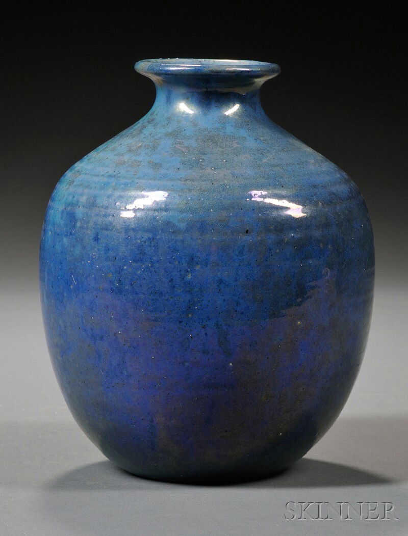 Pewabic Egyptian Blue Vase Glazed earthenware Detroit, Michigan Flared rim on bulbous form in speckl: Pewabic Egyptian Blue Vase Glazed earthenware Detroit, Michigan Flared rim on bulbous form in speckled iridescent Egyptian blue glaze, with round Pewabic Detroit stamp on base, chip to base, ht. 7 3/4