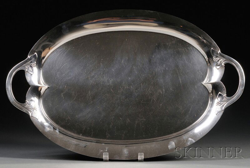 , Frank Smith Sterling Silver Tray, Wood lily pattern, Oval form with floral accents near handles, m: Frank Smith Sterling Silver Tray Wood lily pattern Gardner, Massachusetts, 1886-1958 Oval form with floral accents near handles, maker's mark, sterling 625A, approx. 83 troy oz., lg. 24 1/4, wd. 15 5/