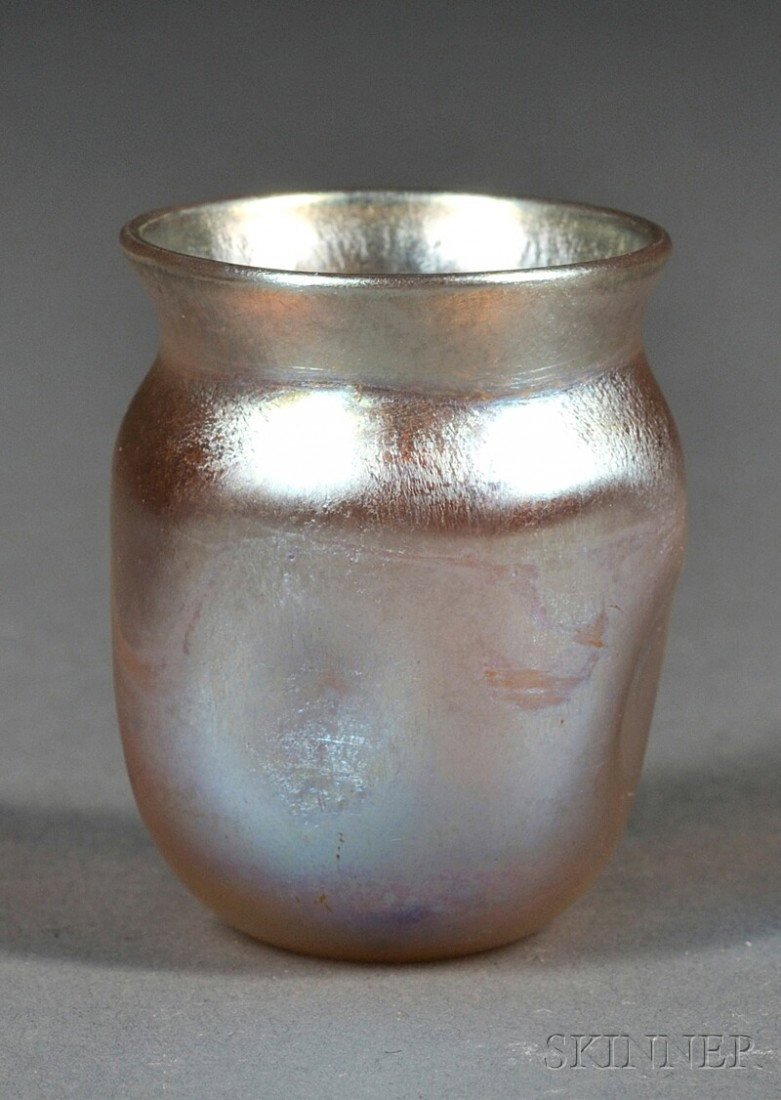 Tiffany Gold Favrile Toothpick Holder Art glass New York, early 20th century Pinched sides on gold i: Tiffany Gold Favrile Toothpick Holder Art glass New York, early 20th century Pinched sides on gold iridescent body, ht. 1 7/8 in.