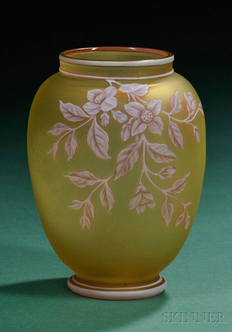Thomas Webb and Sons Art Nouveau Cameo Glass Vase Art glass Stourbridge, England White over pink flo: Thomas Webb and Sons Art Nouveau Cameo Glass Vase Art glass Stourbridge, England White over pink floral cameo decoration on a citron ground with insect on opposing side, maker's mark on base, ht. 5 3/
