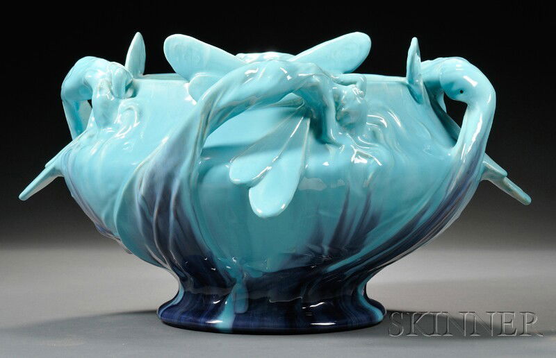 Massier Jardiniere Art pottery France, early 20th century Wide form decorated with four winged femal: Massier Jardiniere Art pottery France, early 20th century Wide form decorated with four winged female figures around rim, in turquoise shading to dark blue glaze imprinted with Massier mark, raised on