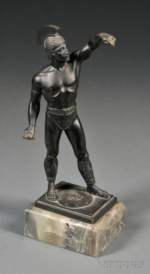 Continental School, 20th Century View of a Warrior with Medusa Shield Signed and dated "FERD. OTRADO: Continental School, 20th Century View of a Warrior with Medusa Shield Signed and dated "FERD. OTRADOVSKY 1927" within the cast on the base. Black patinated bronze, 11 1/4 x 4 x 3 in., mounted to an on