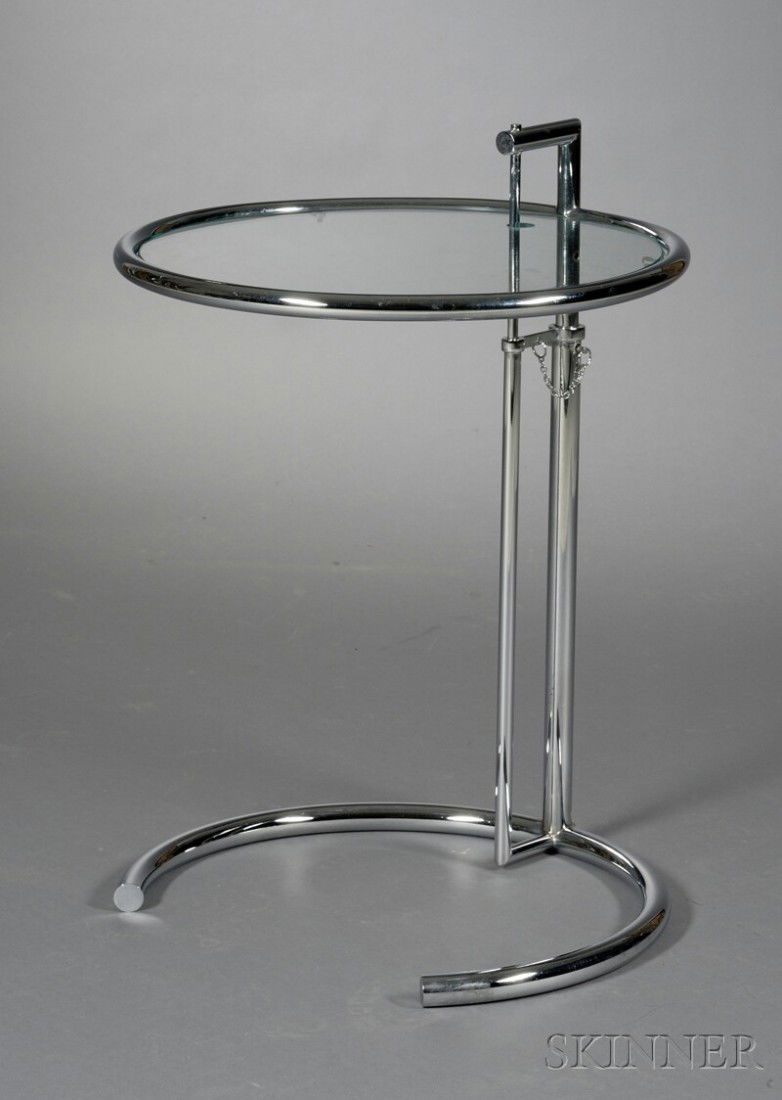 , Eileen Gray (1878-1976) Design Adjustable Side Table, Glass and tubular metal, Circular top with a: Eileen Gray (1878-1976) Design Adjustable Side Table Glass and tubular metal 20th century Circular top with adjustable bar on semicircular foot, ht. 28, dia. 20 in.
