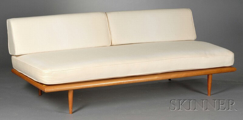 George Nelson for Herman Miller Daybed Wood, metal, and fabric Herman Miller, Zeeland, Michigan, 195: George Nelson for Herman Miller Daybed Wood, metal, and fabric Herman Miller, Zeeland, Michigan, 1956 Back rail raised on two posts, flat bench with cream-colored upholstered cushions, raised on taper