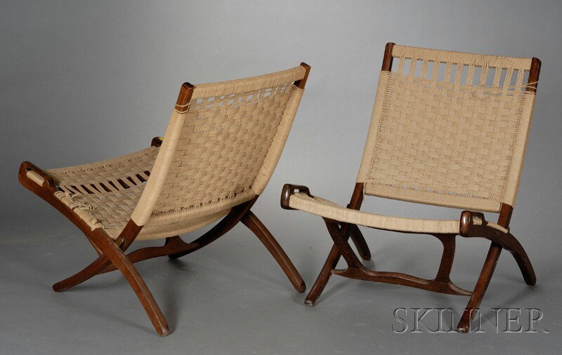 Two Mid-Century Modern Folding Chairs Walnut and natural rope Yugoslavia Woven seat and back in fold: Two Mid-Century Modern Folding Chairs Walnut and natural rope Yugoslavia Woven seat and back in folding X-shape frame, loose joints, some rope damage, marked Yugoslavia, ht. 38, wd. 23 1/4, approx. dp