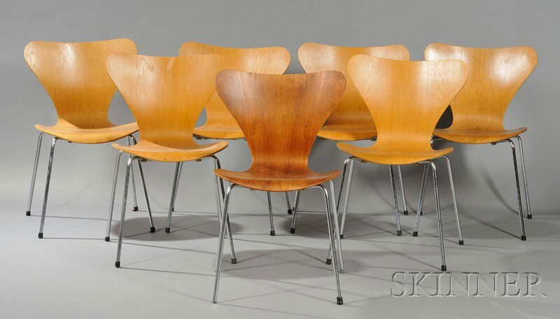 Seven Arne Jacobsen Chairs Laminated wood and steel Fritz Hansen, Denmark, mid-20th century Laminate: Seven Arne Jacobsen Chairs Laminated wood and steel Fritz Hansen, Denmark, mid-20th century Laminated plywood molded seat and back on four tubular steel bent legs, some water stains, ht. 29 1/2, wd. 1