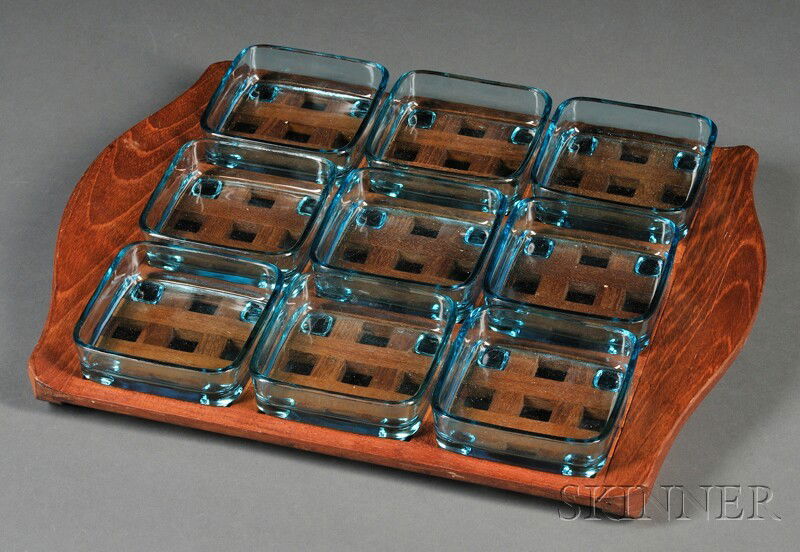 Jens Quistgaard Tray and Condiment Dishes Teak and glass Denmark Nine square condiment dishes in blu: Jens Quistgaard Tray and Condiment Dishes Teak and glass Denmark Nine square condiment dishes in blue glass with four feet which fit into latticed square tray with shaped handles, impressed with JHQ D