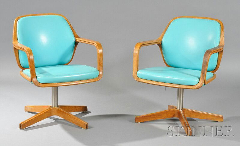 Two Armchairs by Charles Pollock for Knoll Associates Simulated leather, walnut, and metal New York,: Two Armchairs by Charles Pollock for Knoll Associates Simulated leather, walnut, and metal New York, fourth quarter 20th century Aqua simulated leather seat and back on wood frame, swivels on pedestal