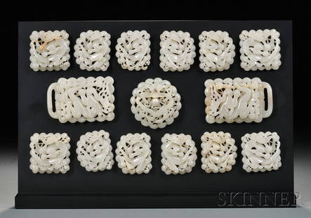 Set of Fifteen Jade Belt Plaques, China, possiblyY: Set of Fifteen Jade Belt Plaques, China, possiblyYuan to Ming period, 14th/15th century, celadon gray stone with russet areas, carving of dragons and clouds, lg. 1/2 to 3 1/2 in.