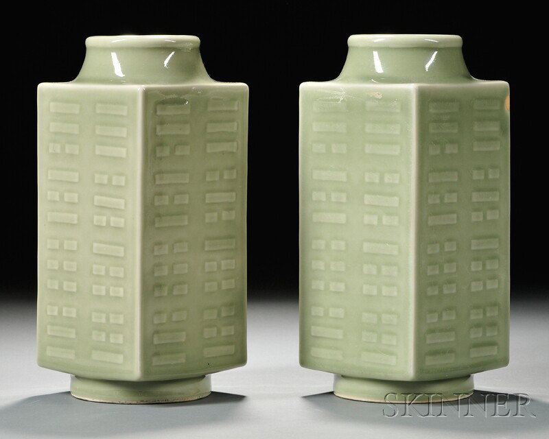 Pair of Celadon Vases, China, of archaic ritual j: Pair of Celadon Vases, China, of archaic ritual jade cong shape, with raised design of trigrams to each side, overall light olive green glaze, Qianlong mark to the base, ht. 11 3/8 in.