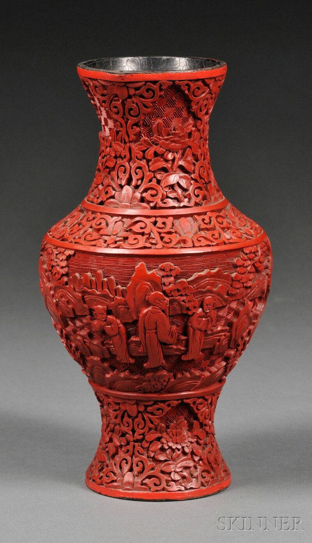 Cinnabar Vase, China, baluster form decorated wit: Cinnabar Vase, China, baluster form decorated with Immortals in a landscape of trees, rocks, and mountains, with scrolling flower bands on the neck, shoulder, and base, ht. 9 in.