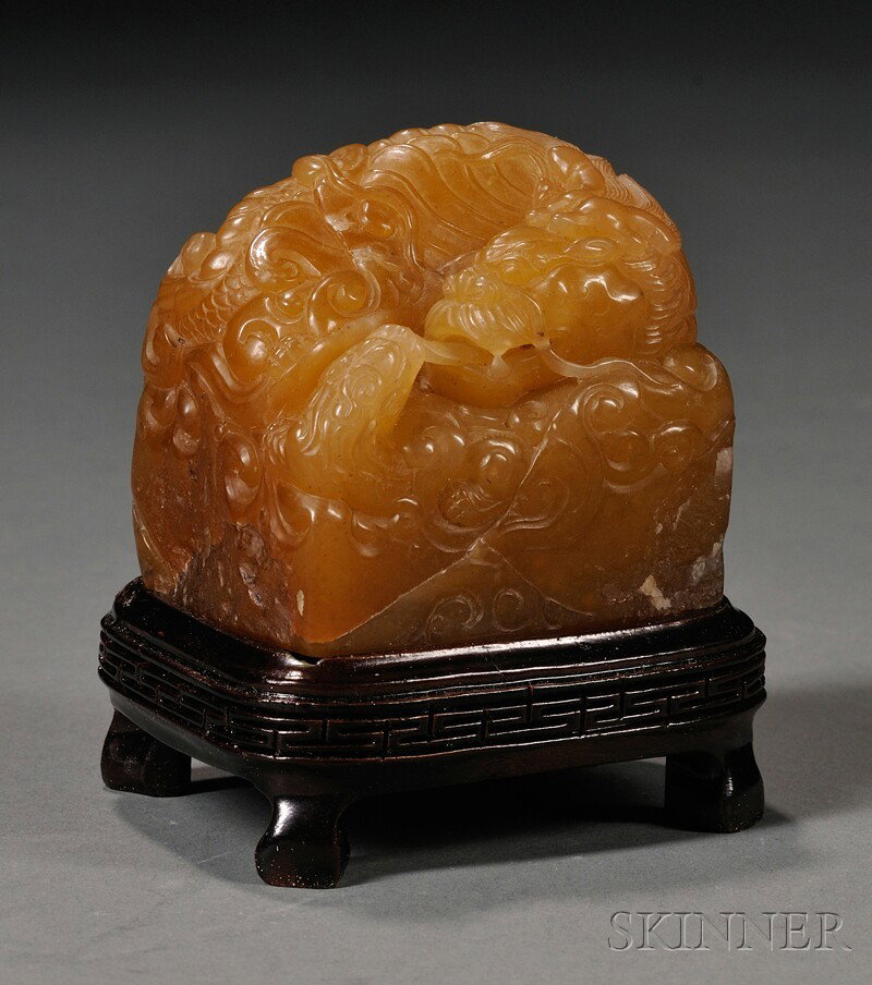 Soapstone Seal, China, rectangular, with a dragon: Soapstone Seal, China, rectangular, with a dragon group finial, carved seal surface, with stand, ht. 2 3/8 in.