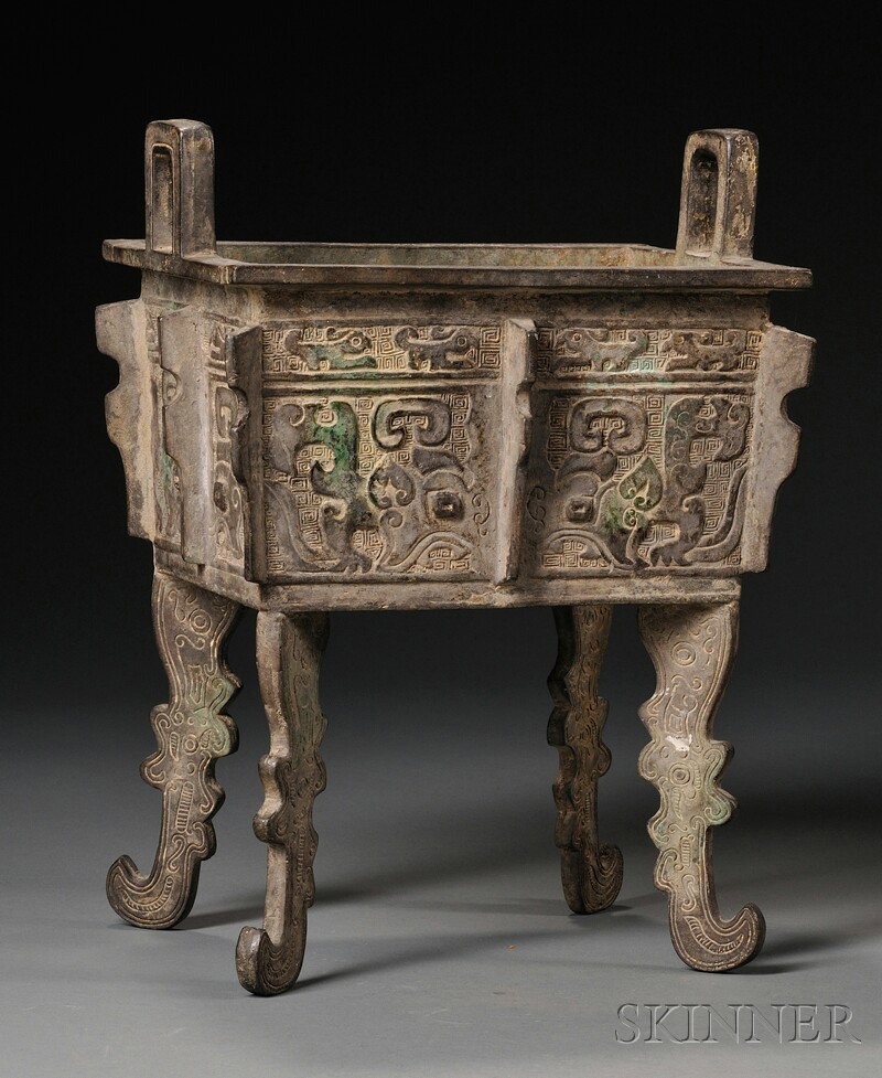 Bronze Censer, China, square, archaic-style vesse: Bronze Censer, China, square, archaic-style vessel decorated with taotie, flanges, and four stylized dragon legs, with square handles at rim, ht. 13 5/8 in.