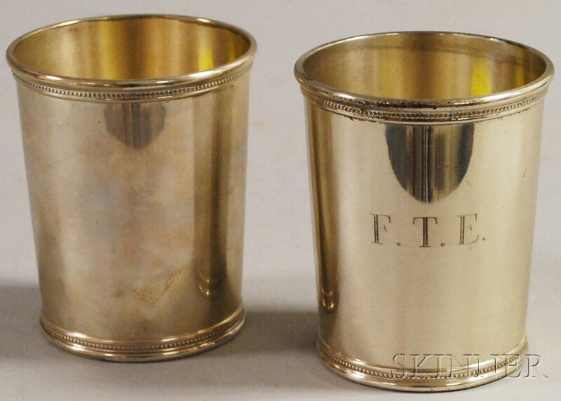 Pair of Sterling Silver Mint Julep Cups, marked "L: Pair of Sterling Silver Mint Julep Cups, marked "LBJ" and engraved "Mark J. Scearce, Shelbyville, Kentucky" on the base, approx. 9.5 troy oz., ht. 3 3/4 in.