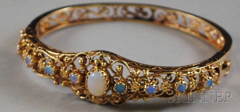 14kt Gold and Opal Bangle Bracelet, total 15.9 dwt: 14kt Gold and Opal Bangle Bracelet, total 15.9 dwt, interior cir. 7 in.
