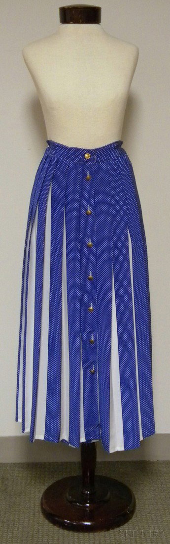 Balenciaga Pleated Skirt, with alternating pleats : Balenciaga Pleated Skirt, with alternating pleats of white and blue-and-white polka dot, with gold-tone button closures down the front, size 6.