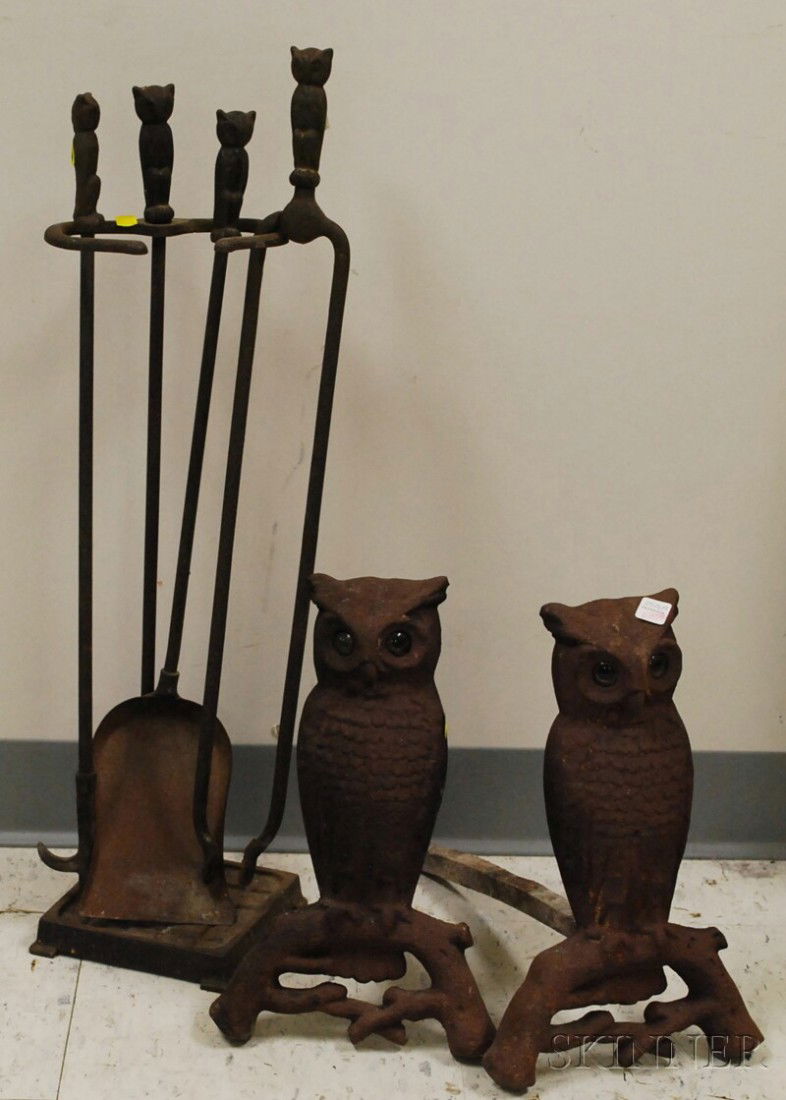 Pair of Cast Iron Owl Andirons with Glass Eyes an: Pair of Cast Iron Owl Andirons with Glass Eyes and a Set of Three Matching Owl-handled Tools with Stand, andiron ht. 14 in.