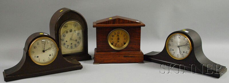 Four Assorted Mantel Clocks, three are eight-day: Four Assorted Mantel Clocks, three are eight-day time and strike examples, including a Seth Thomas adamantine and two tambour clocks by Ansonia, and an eight-day Ansonia quarter-chiming mantel clock w
