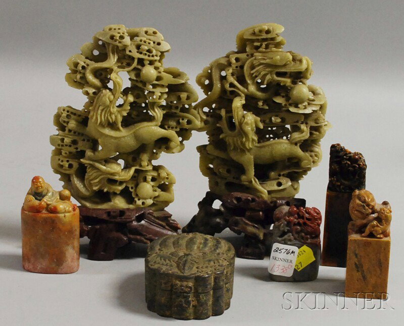 Four Asian Carved Soapstone Seals, Two Carved Jad: Four Asian Carved Soapstone Seals, Two Carved Jade and Soapstone Figurals, and a Small Metal Box.