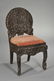 200: Carved Teak Side Chair, the circular openwork back