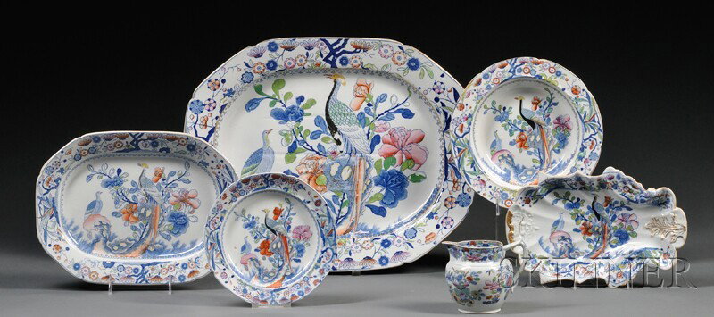 Seventy-one-piece English Ironstone Partial Dinner: Seventy-one-piece English Ironstone Partial Dinner Service, with a polychrome pattern of phoenixes on a rock with flowering foliage, comprising twenty-four plates, approx. dia. 9 1/2; nineteen shallow