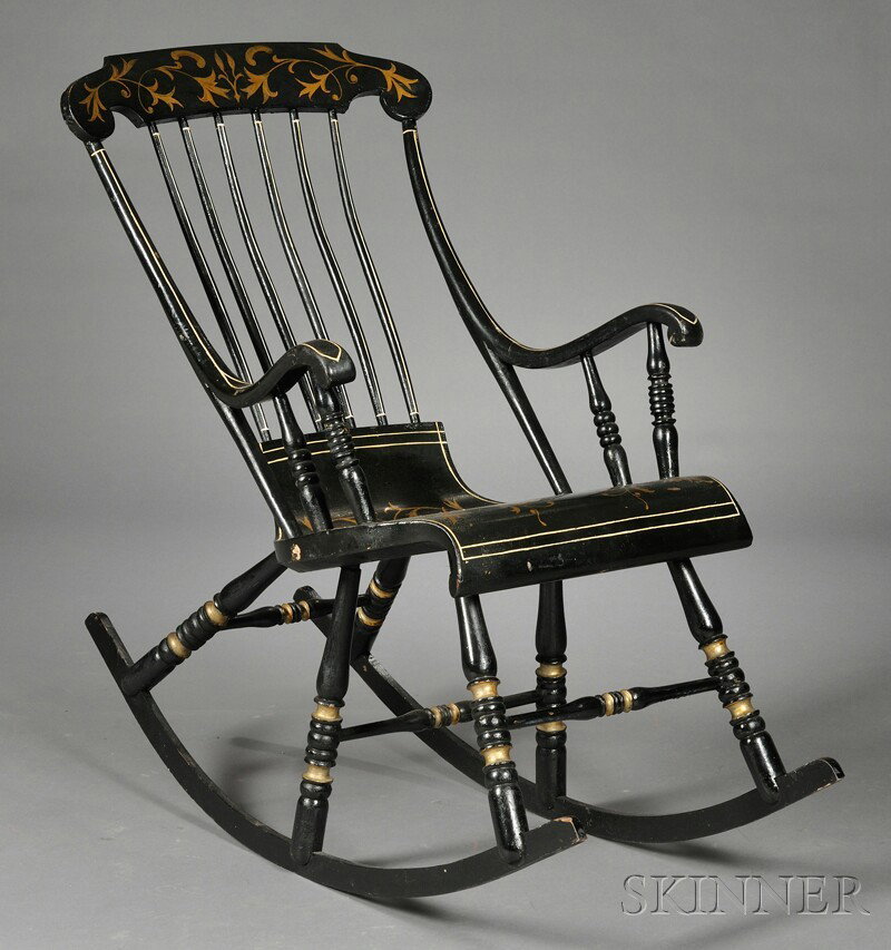 Swedish Black-painted Pine Rocker, 19th century, w: Swedish Black-painted Pine Rocker, 19th century, with comb back, crest and seat decorated with foliate arabesques and polychrome floral spray, on six turned legs, total ht. 41 1/4 in.