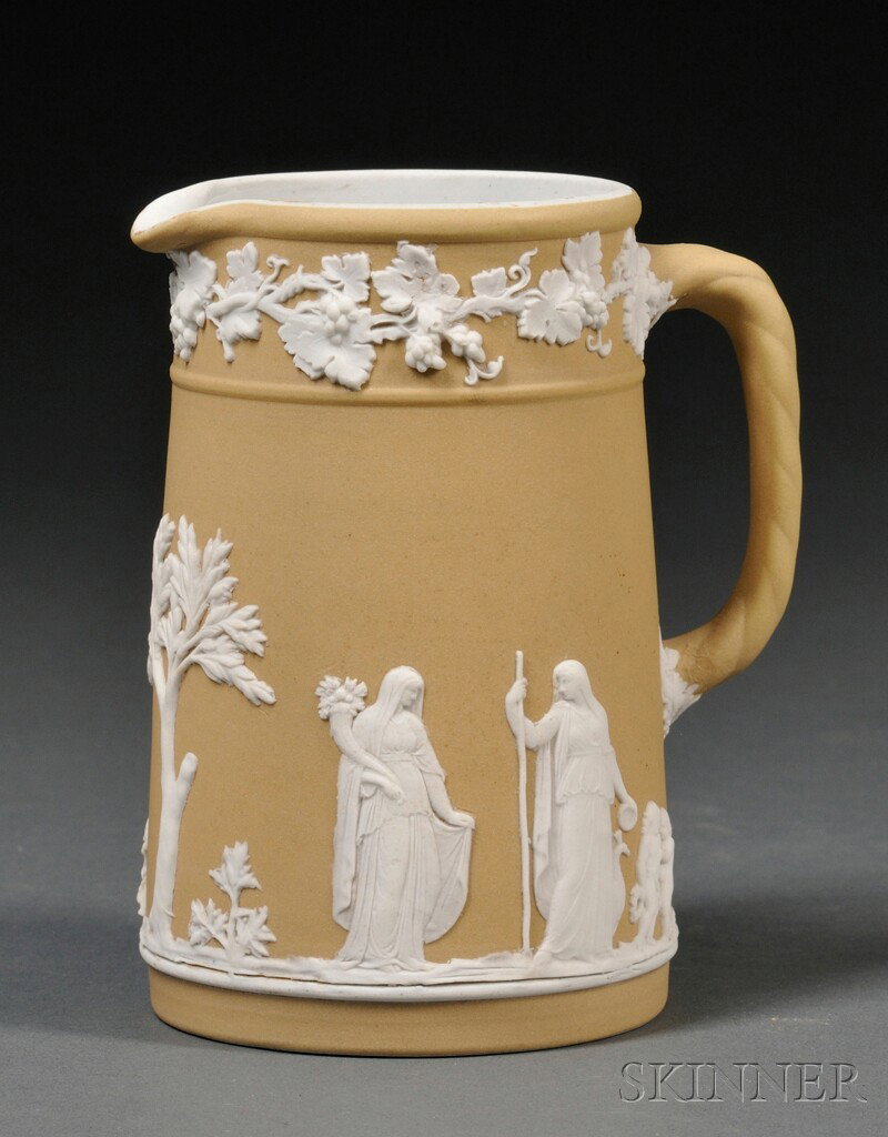 Wedgwood Yellow Jasper Dip Tall Jug, England, earl: Wedgwood Yellow Jasper Dip Tall Jug, England, early 20th century, applied white classical figures below a band of fruiting grapevines, impressed mark, ht. 4 5/8 in.