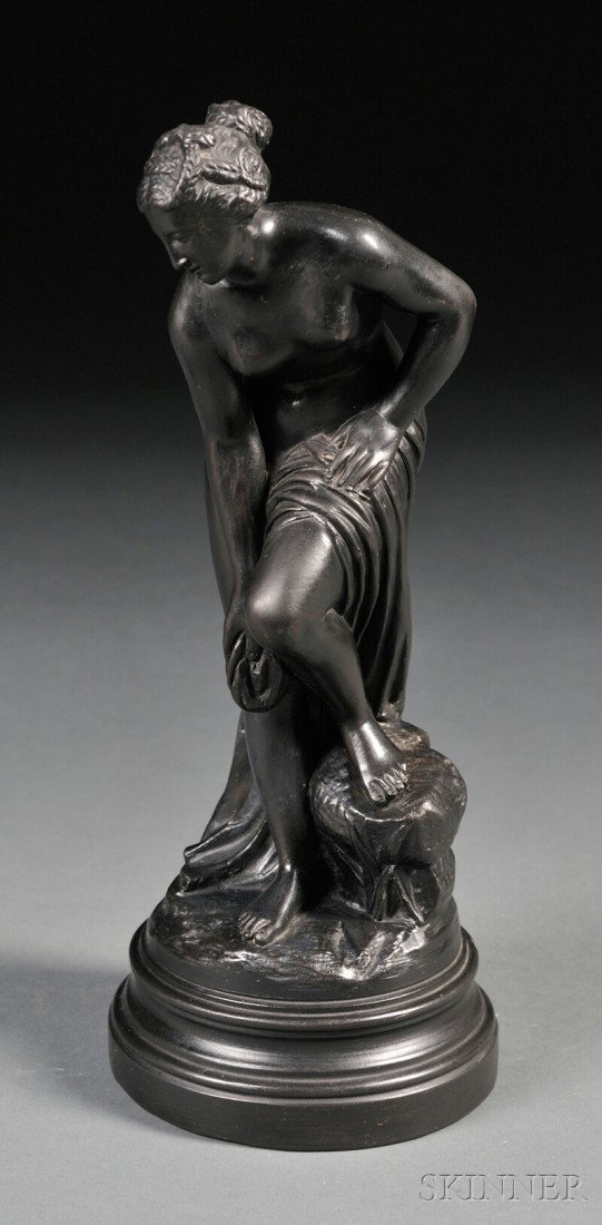 Black Basalt Model of The Bather, England, late 1: Black Basalt Model of The Bather, England, late 19th century, the standing figure modeled standing atop a stepped circular base, unmarked, ht. 10 1/2 in.